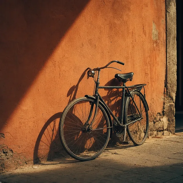 Bicycle against an orange wall